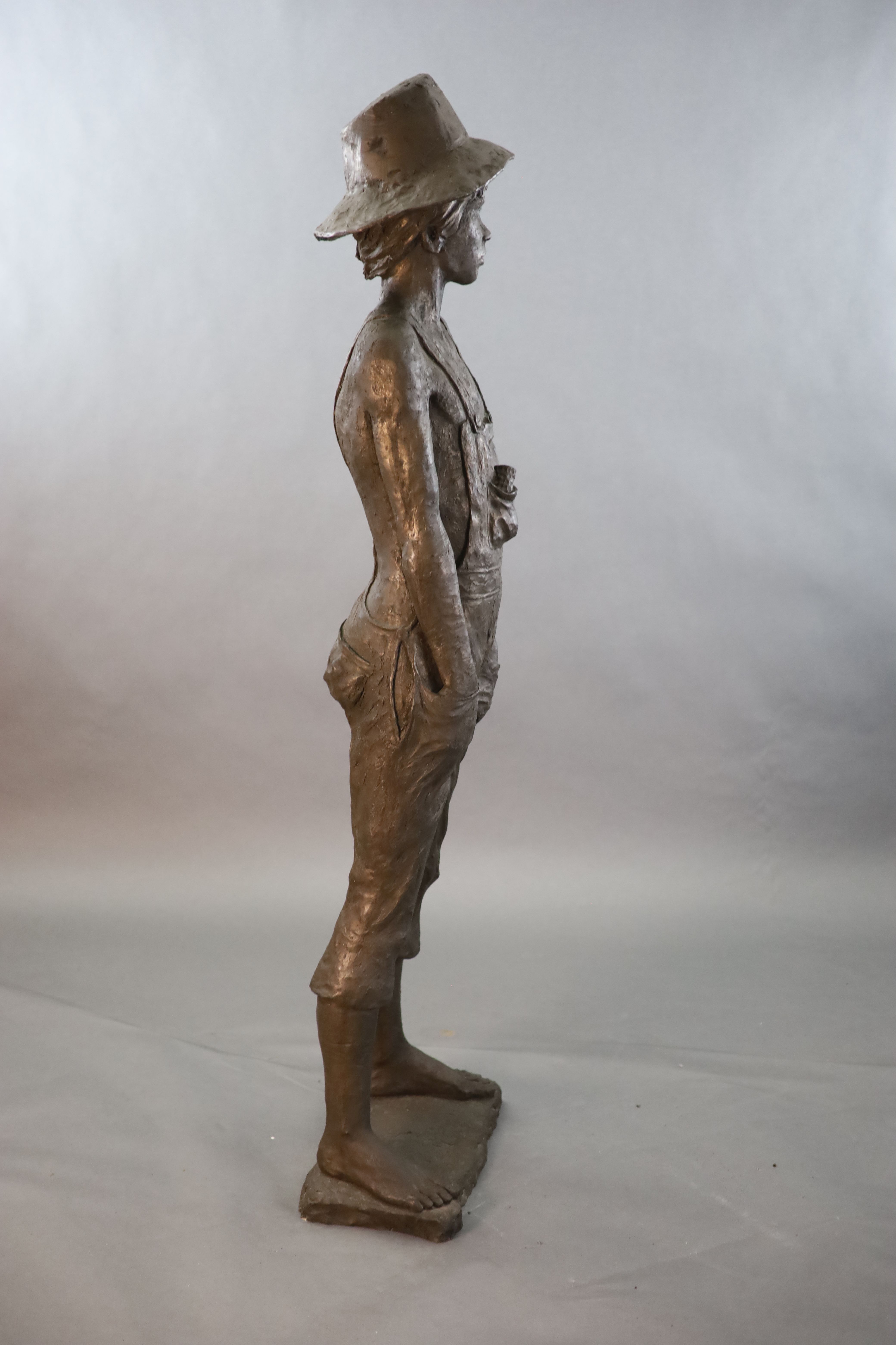 A Neil Godfrey bronzed composition life size figure of Tom Sawyer, height 5ft 2in.